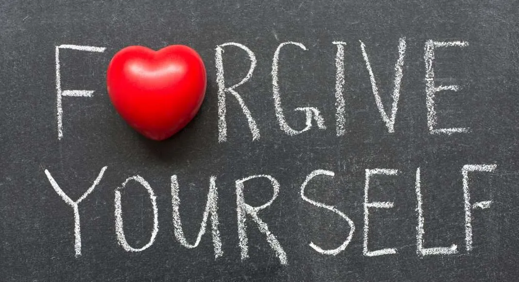 “Illustration of a person releasing burdens of guilt and shame, embracing self‑forgiveness and unconditional love, symbolising inner healing and spiritual growth.”