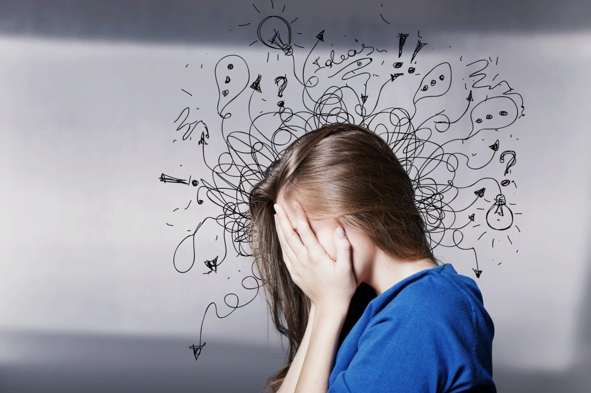 Person learning how to stop overthinking and quiet a racing mind